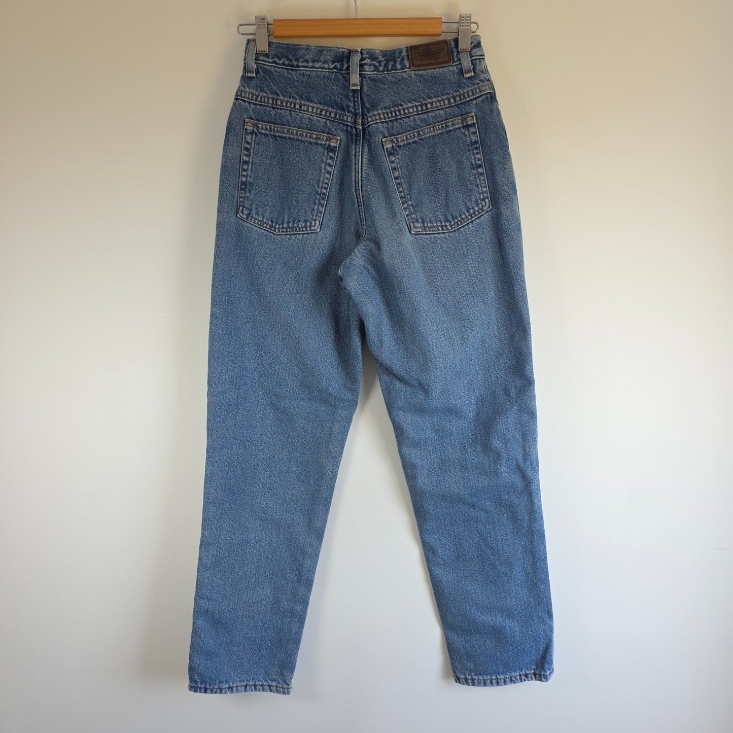 L.L.Bean blue straight jeans with fleece lining and relaxed high rise fit.