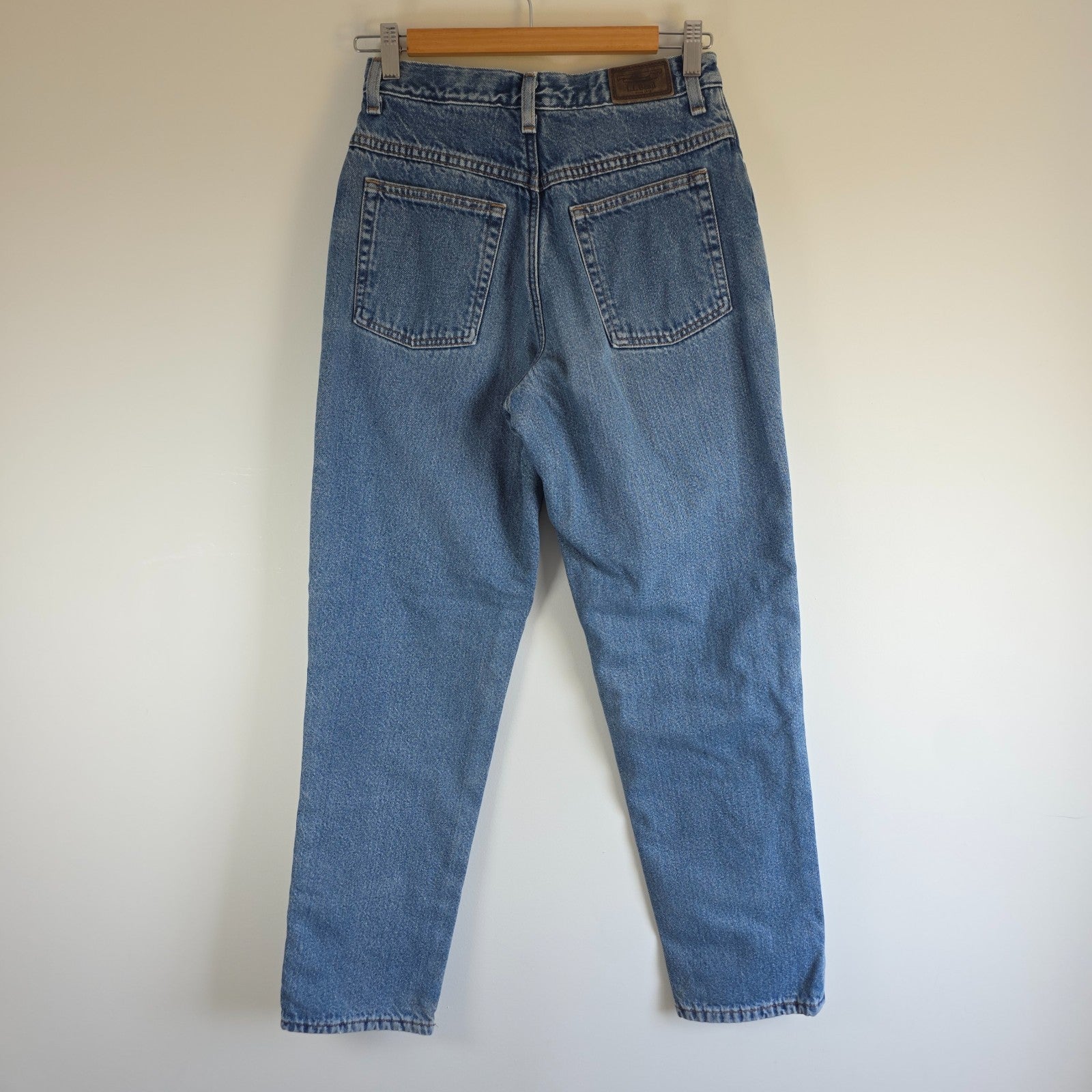 L.L.Bean blue straight jeans with fleece lining and relaxed high rise fit.