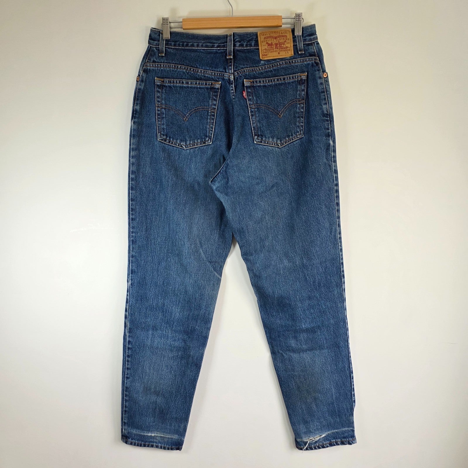 Vintage Levi's 550 Relaxed Fit Jeans Womens W31 L32 Blue Tapered Leg Distressed