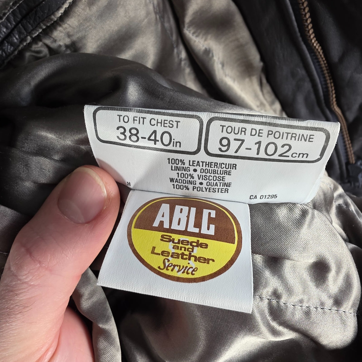 St Michael grey leather bomber jacket with utility pockets and elasticated waistband.