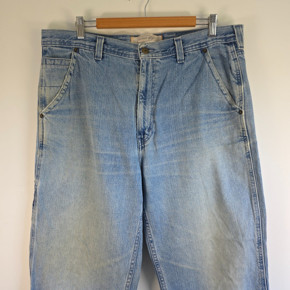 Urban Up blue carpenter jeans with hammer loop and utility pocket detailing.