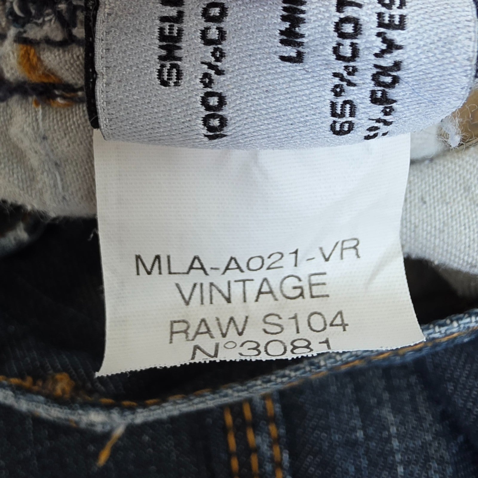 Superdry blue straight jeans with button fly, vintage raw denim, light wear.
