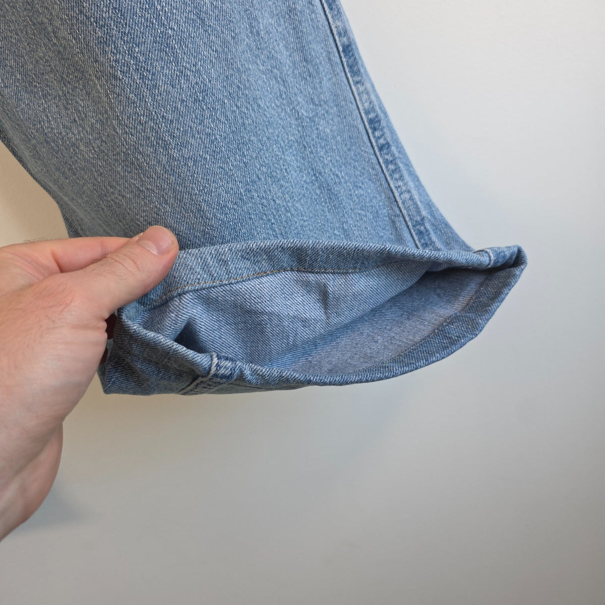 Urban Up blue carpenter jeans with hammer loop and utility pocket detailing.