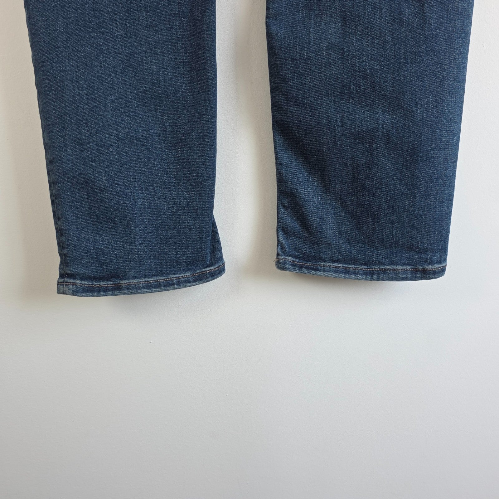 AllSaints blue straight jeans with button fly and stretch cotton-elastane blend.