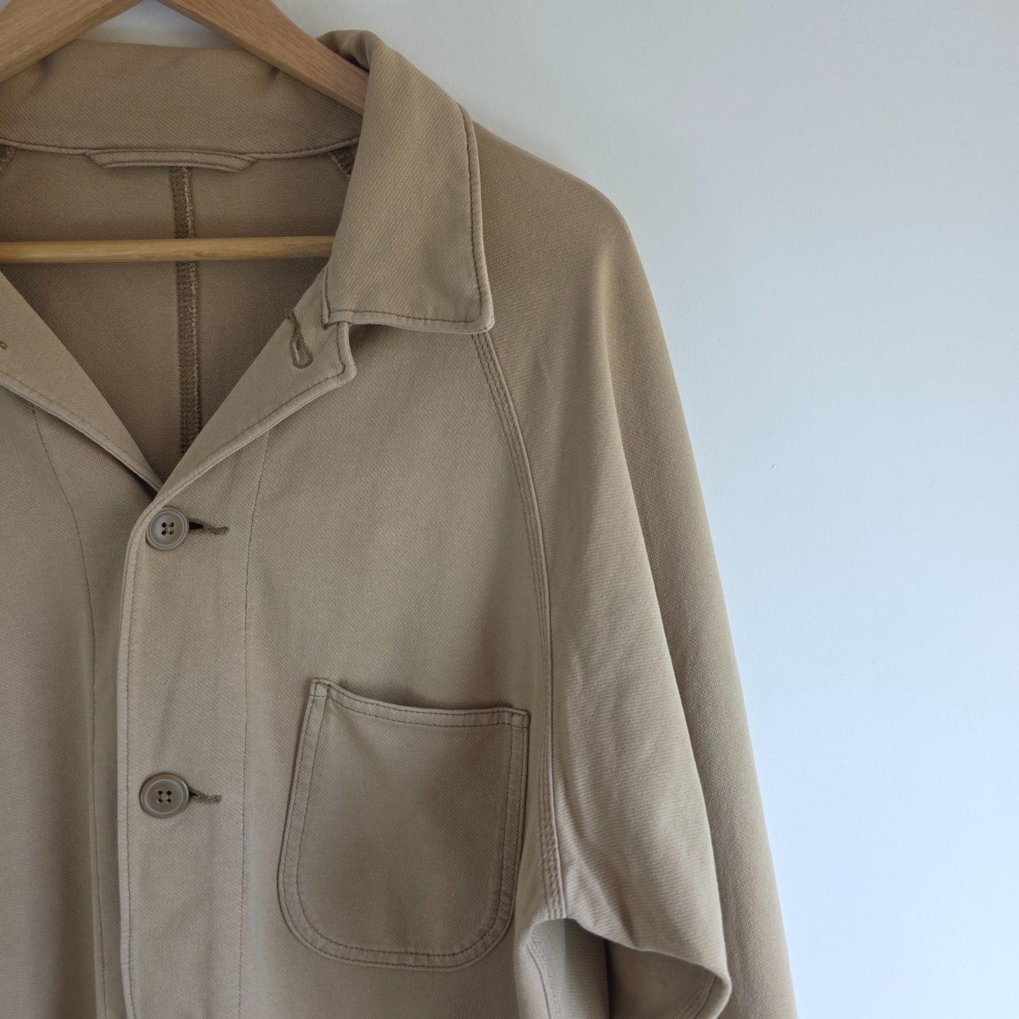 Uniqlo beige chore jacket cotton blend with stretch, classic workwear design.