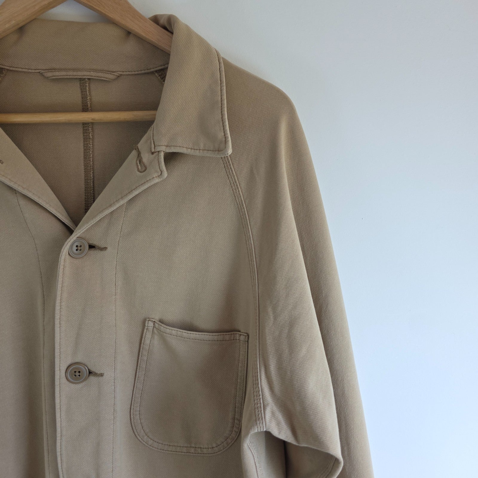 Uniqlo beige chore jacket cotton blend with stretch, classic workwear design.