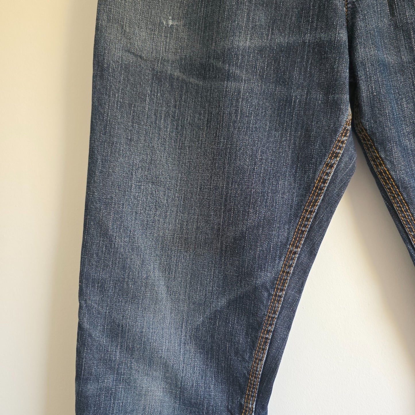 Superdry blue straight jeans with button fly, vintage raw denim, light wear.