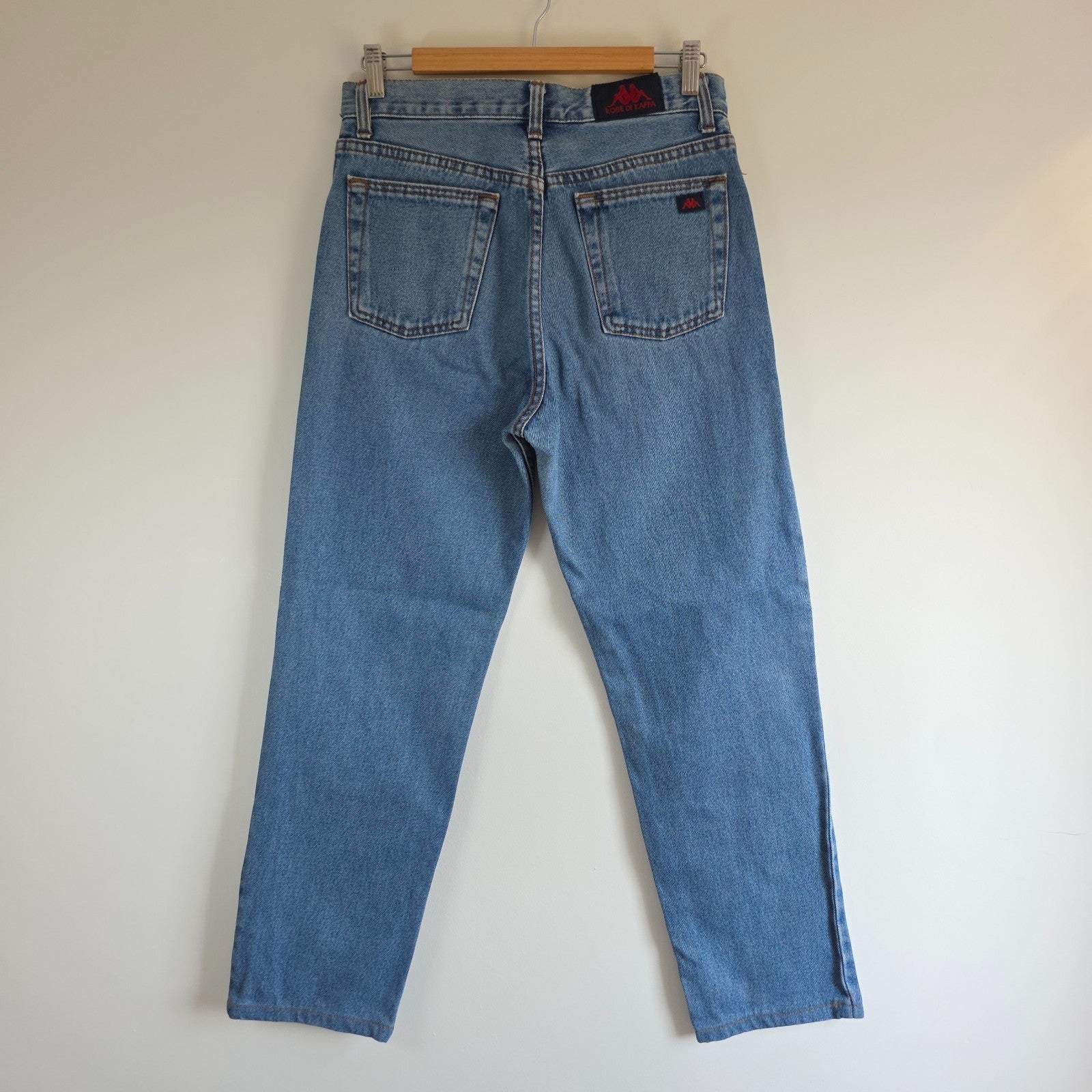 Robe Di Kappa blue straight jeans with vintage wash and subtle logo detail.