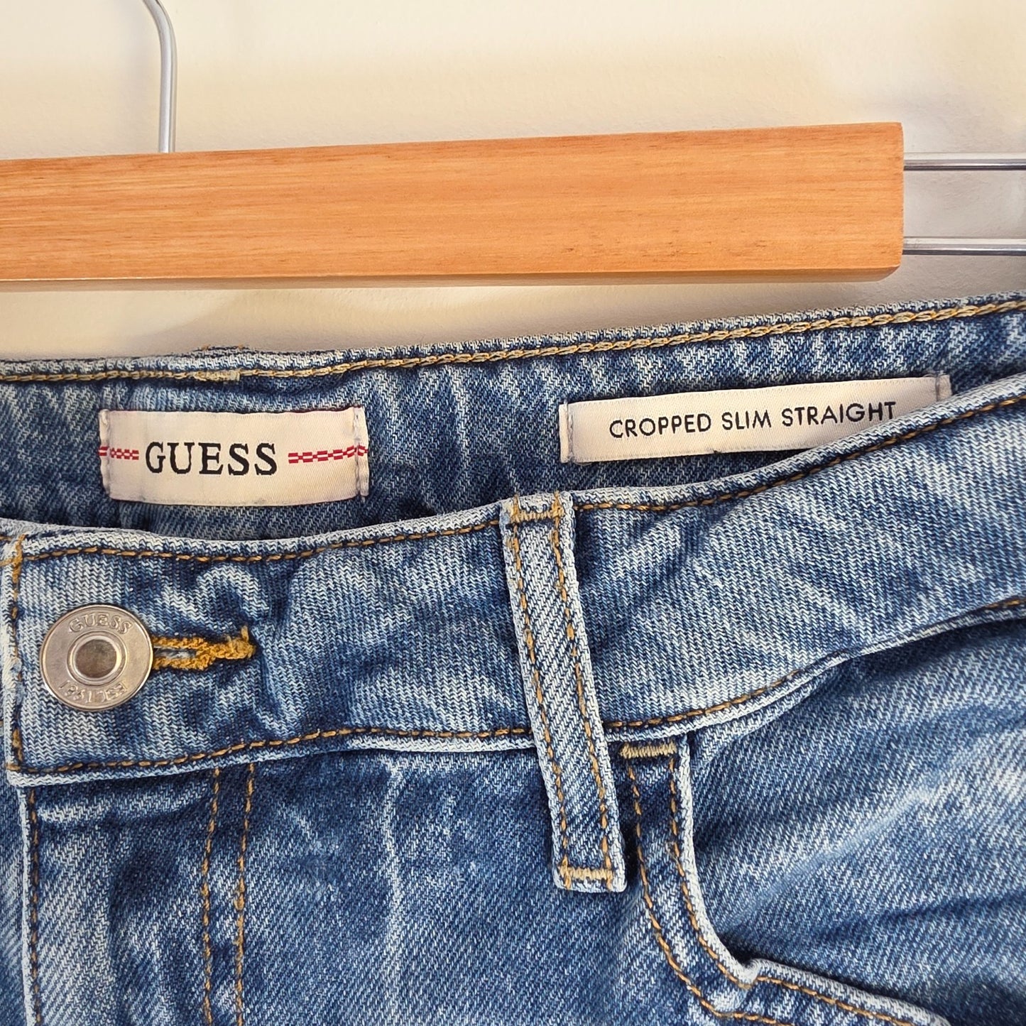 Vintage Guess blue cropped straight jeans with distressed details and high rise fit.