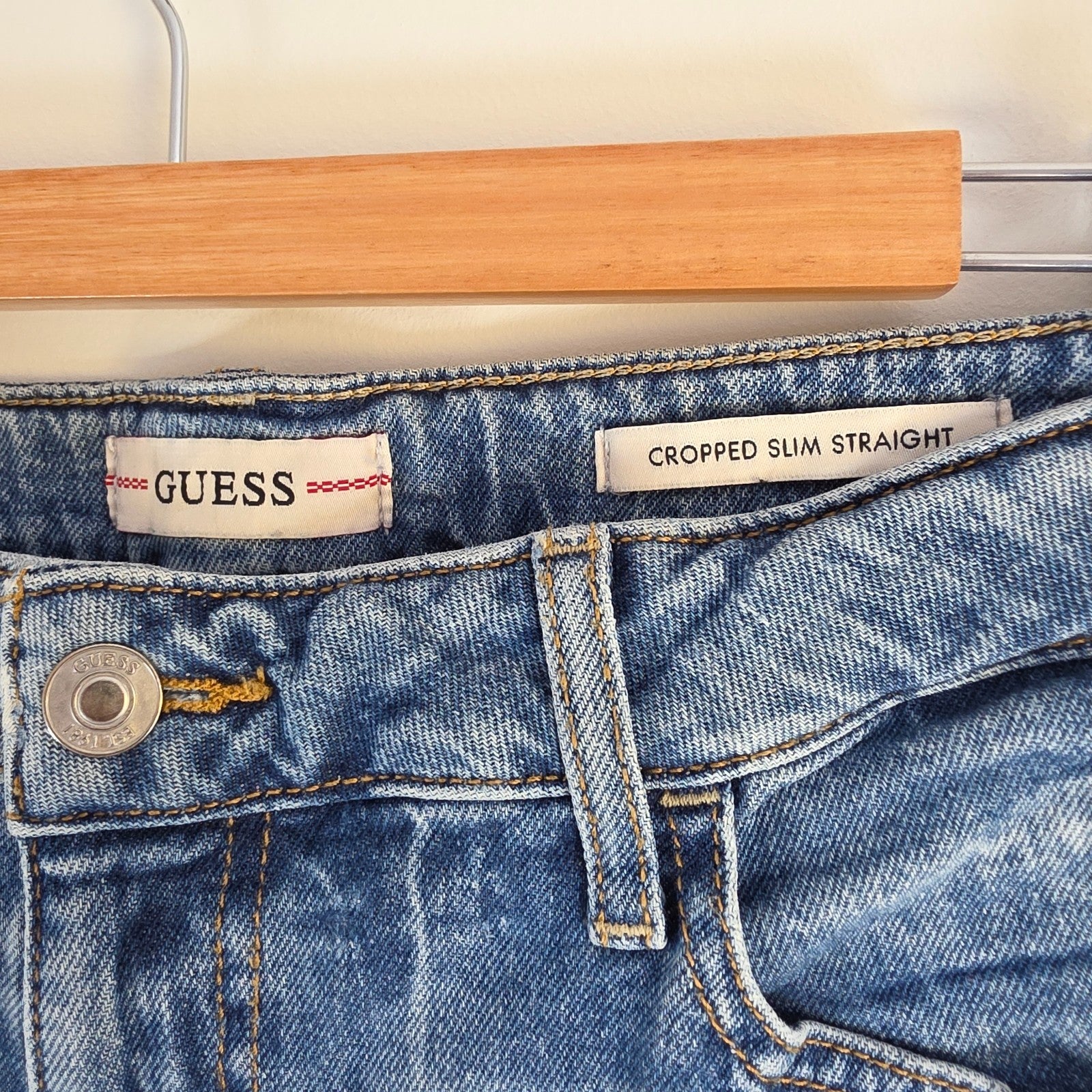 Vintage Guess blue cropped straight jeans with distressed details and high rise fit.