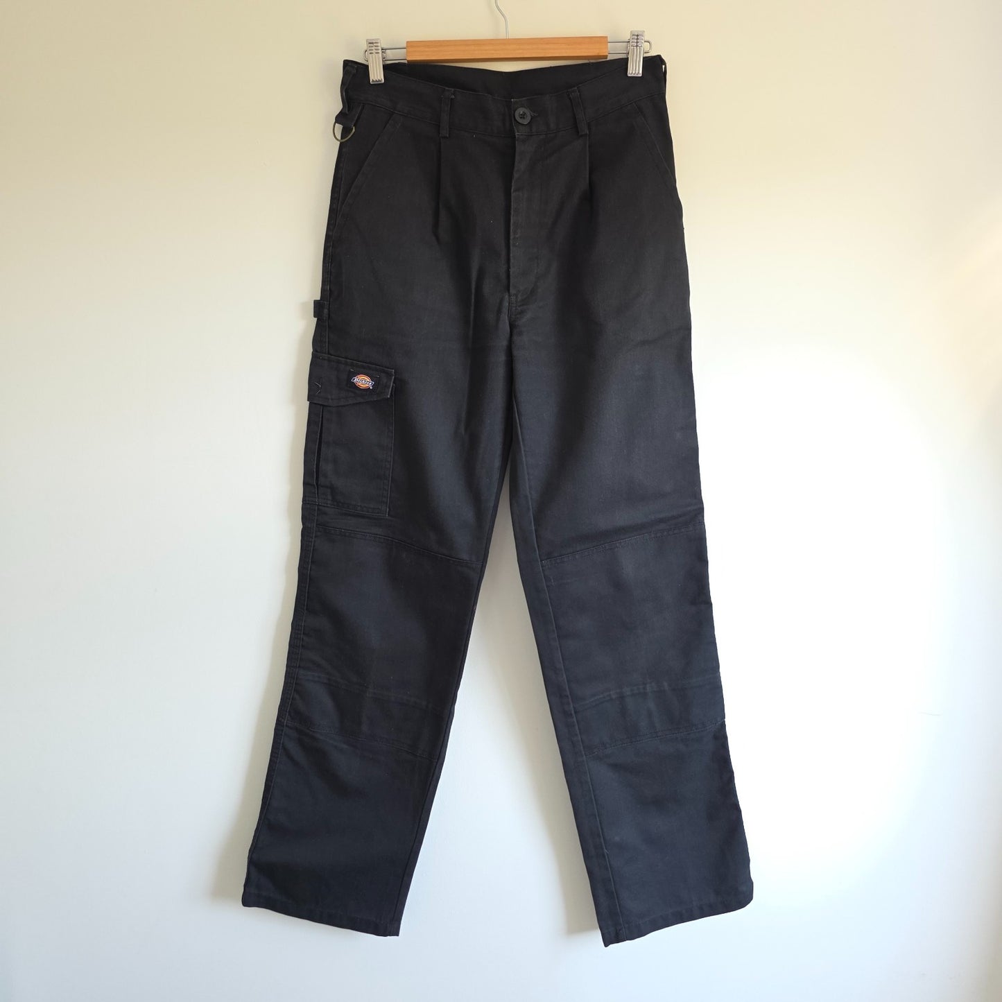 Dickies black cargo trousers with double knee panels and hammer loop detail.