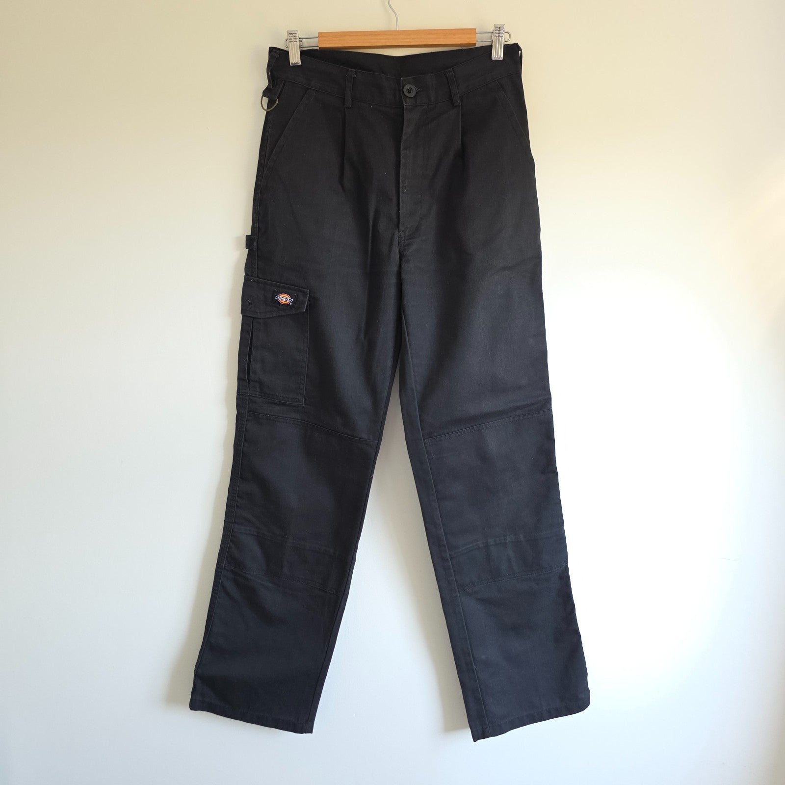Dickies black cargo trousers with double knee panels and hammer loop detail.