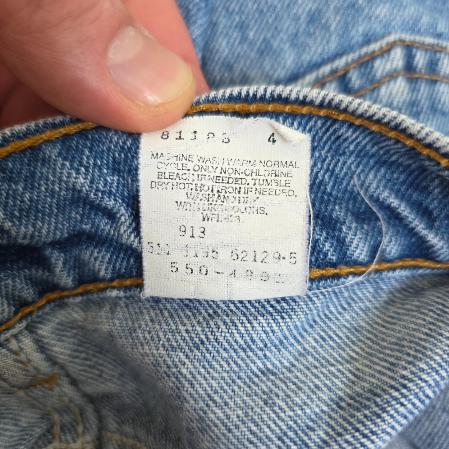 Levi's blue straight jeans vintage 550 relaxed fit with classic 90s silhouette.
