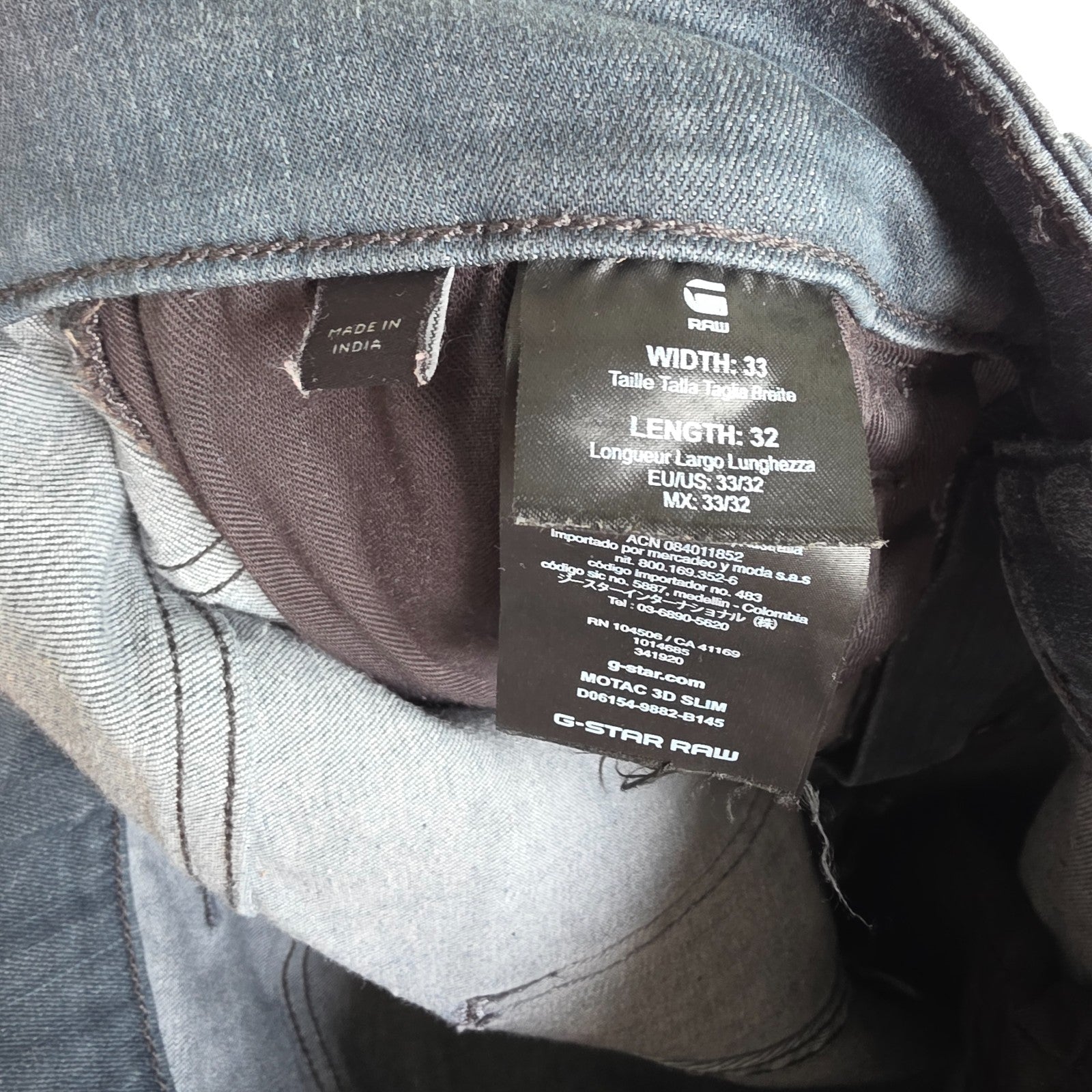 G-Star blue stretch denim slim jeans with biker detailing and logo patch.