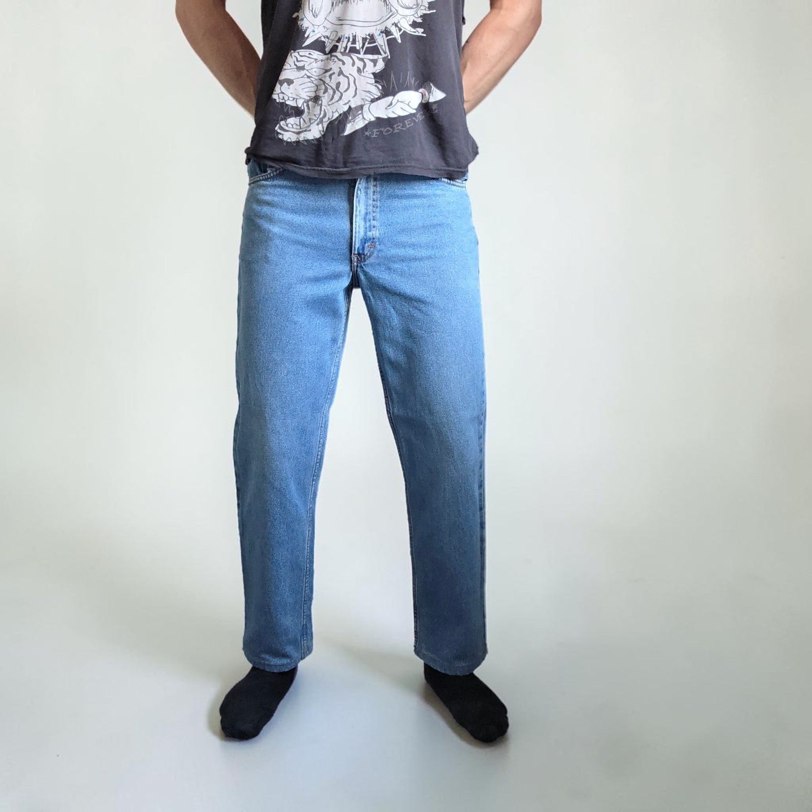 Robe Di Kappa blue straight jeans with vintage wash and subtle logo detail.