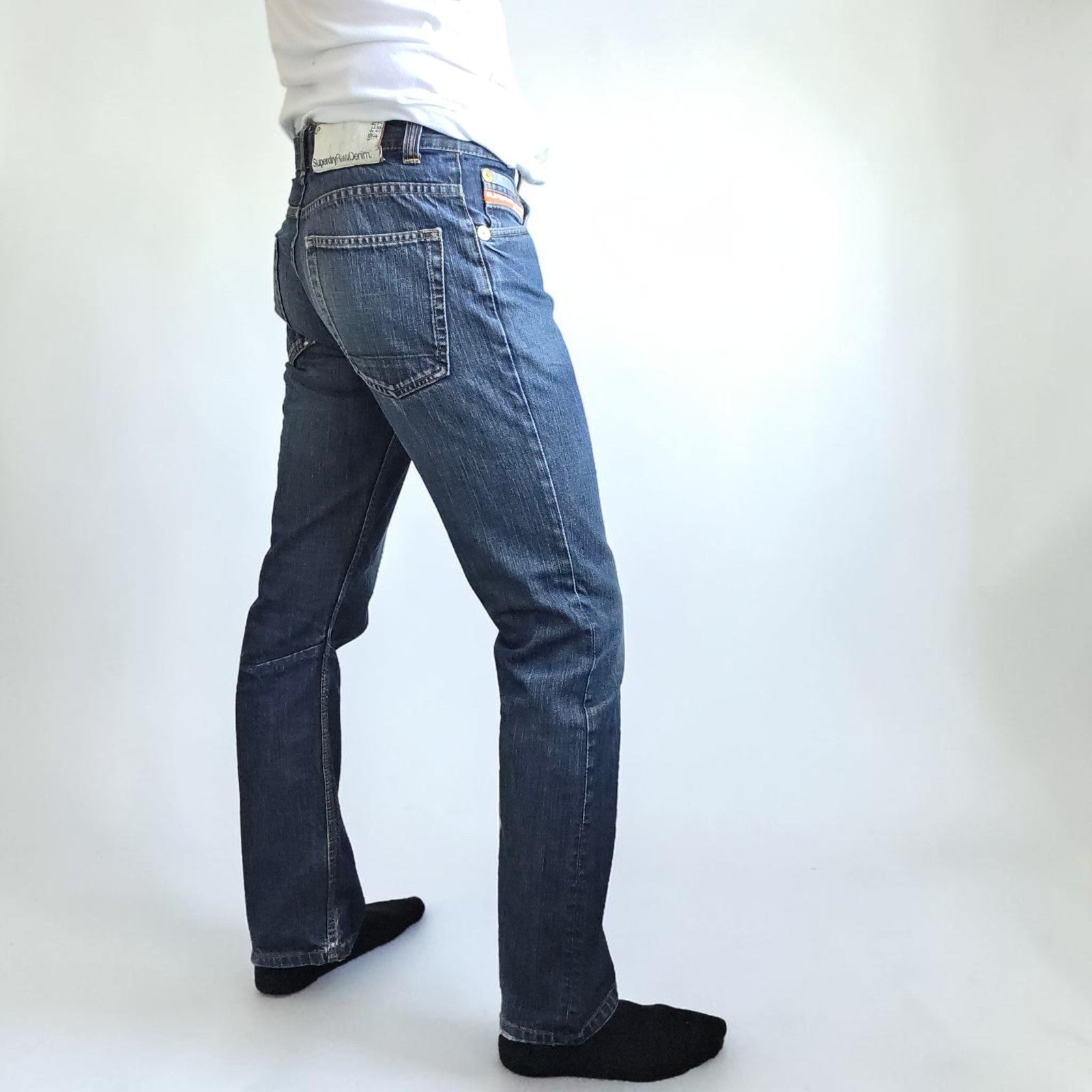Superdry blue straight jeans with button fly, vintage raw denim, light wear.