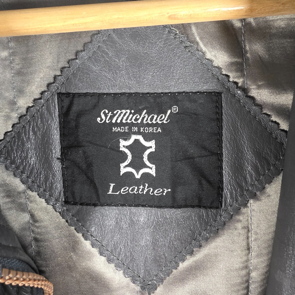 St Michael grey leather bomber jacket with utility pockets and elasticated waistband.