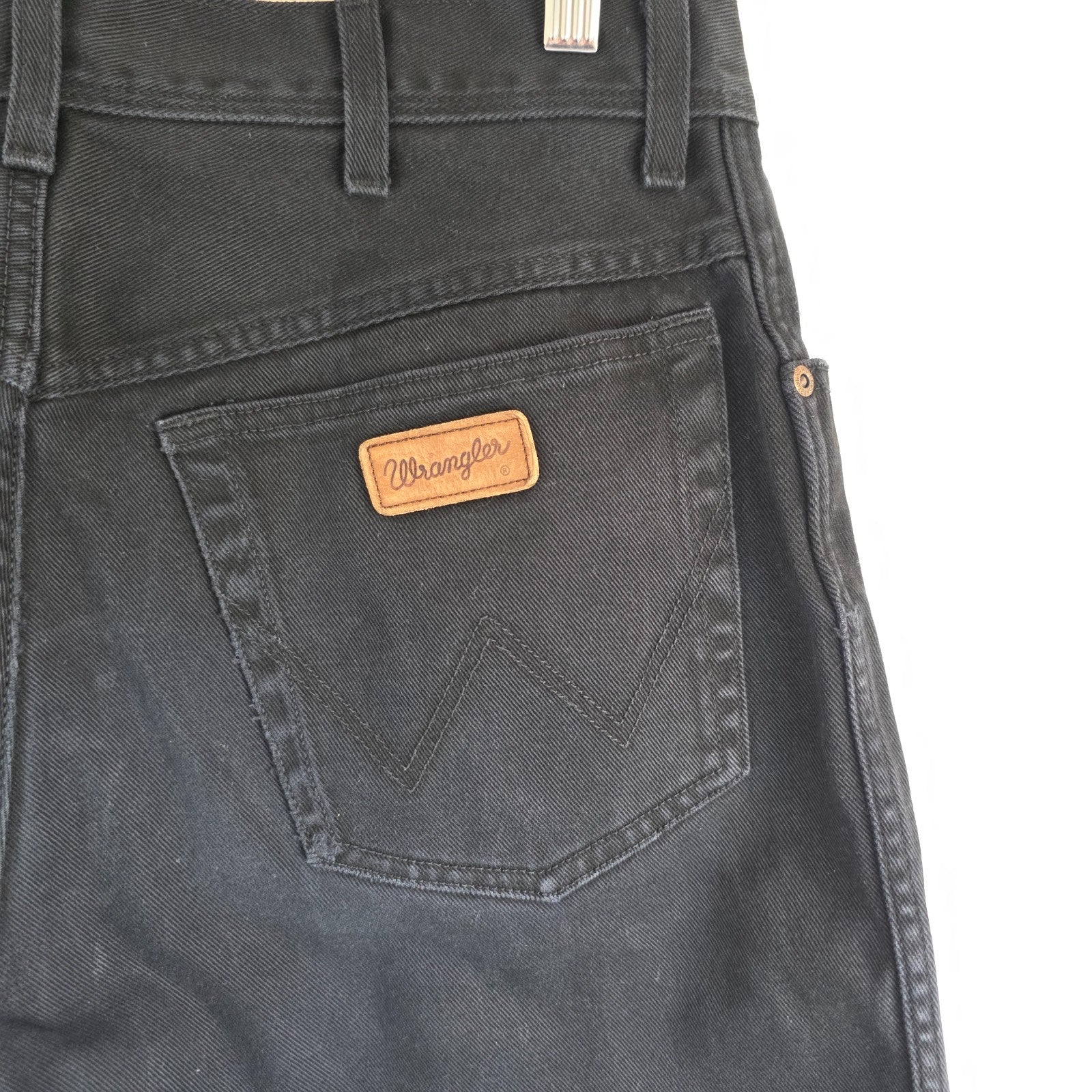 Wrangler black denim shorts W33 with frayed hems and copper-toned button.