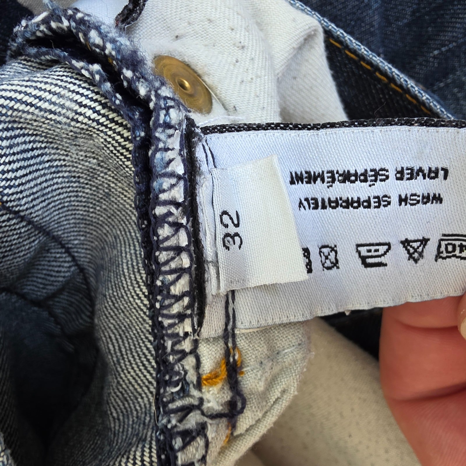 Superdry blue straight jeans with button fly, vintage raw denim, light wear.