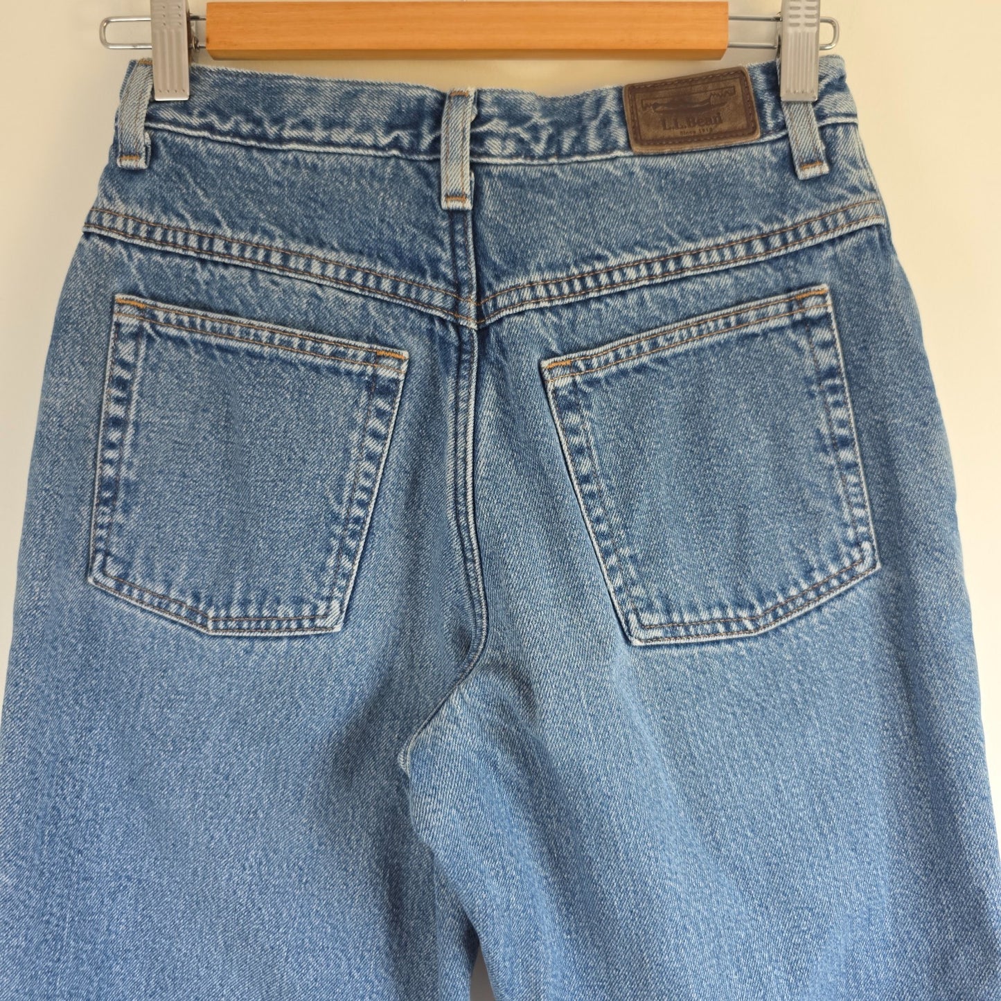 L.L.Bean blue straight jeans with fleece lining and relaxed high rise fit.