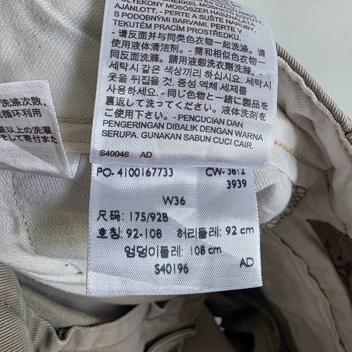 Levi's beige cargo shorts with utility pockets and cotton material, very good condition.