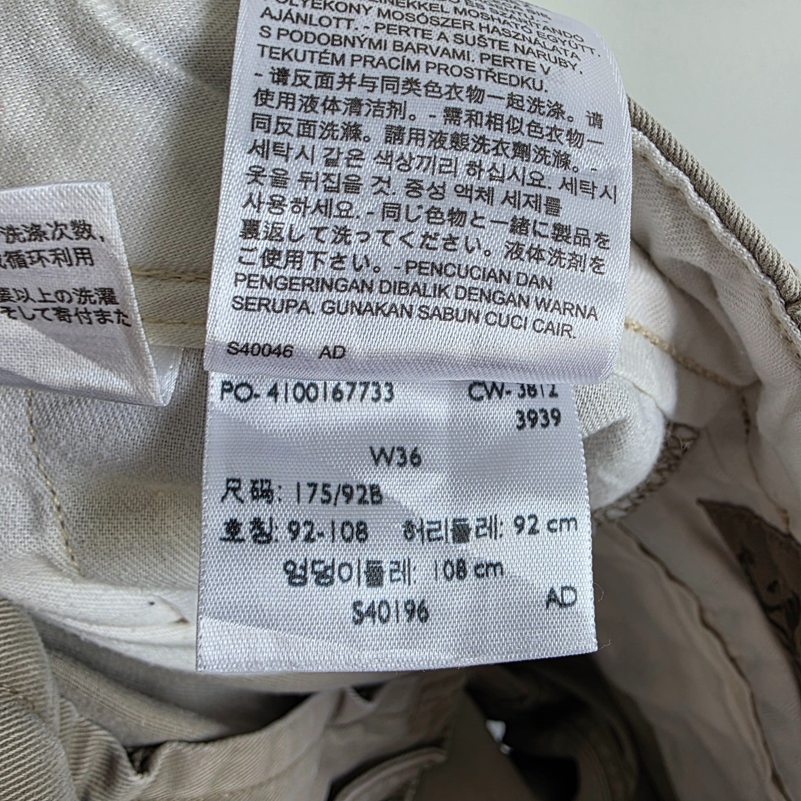 Levi's beige cargo shorts with utility pockets and cotton material, very good condition.
