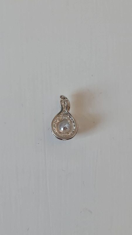 Silver Swirl Pendant with Clear Stones